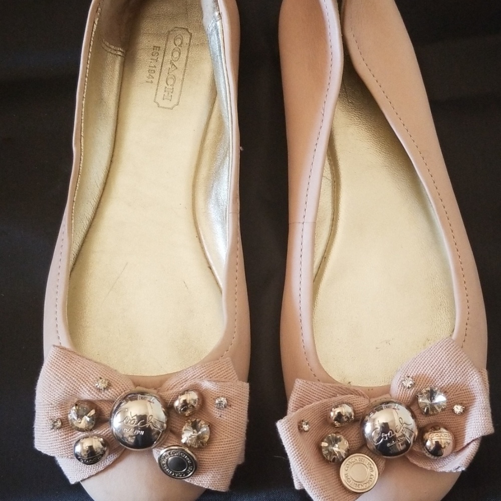 Light beige Coach flats